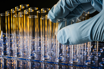 Gloved Hand Handling Pipettes